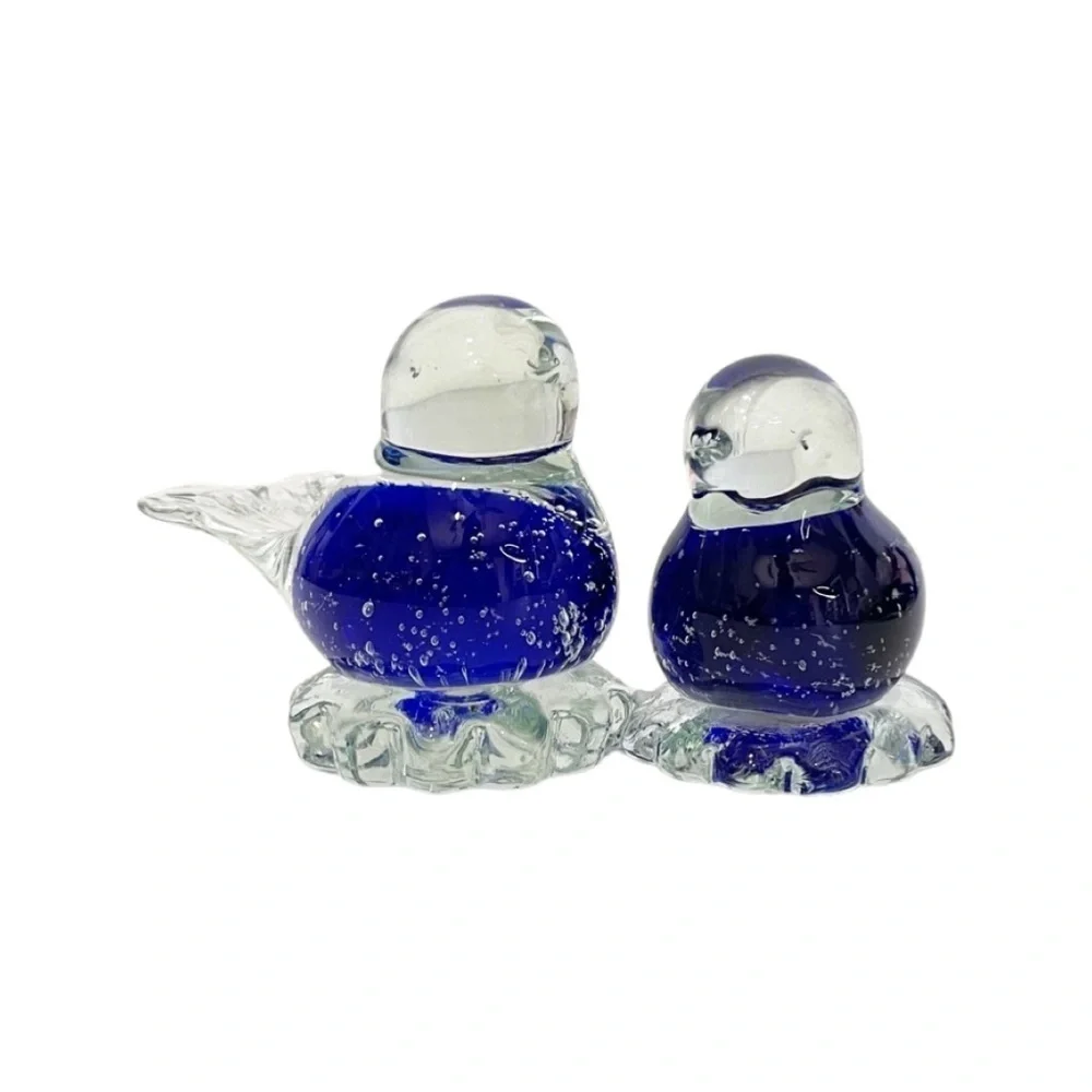 Vintage (2) small Snowflakes blue bird blown clear glass figurines.